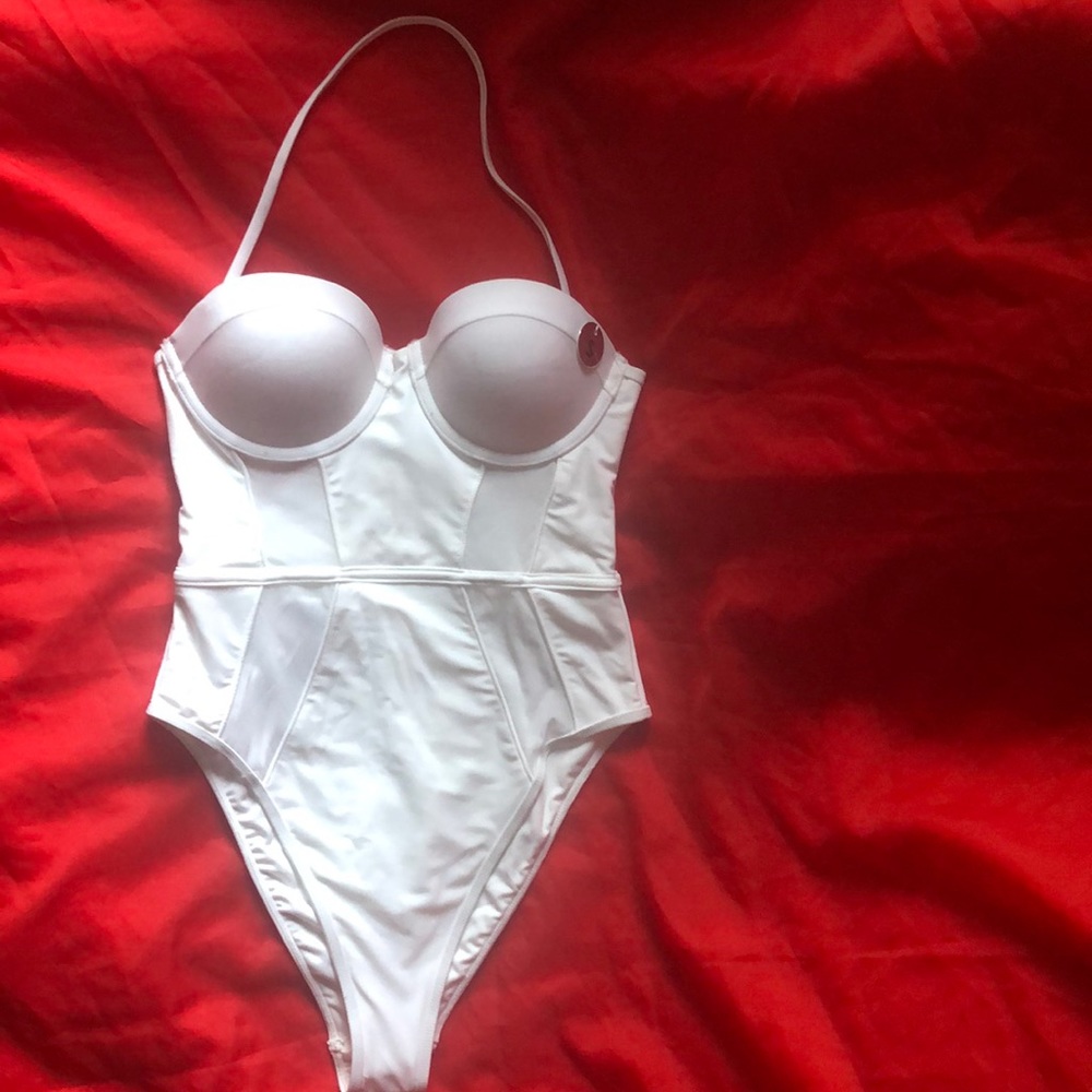White chic one piece bathing suit.